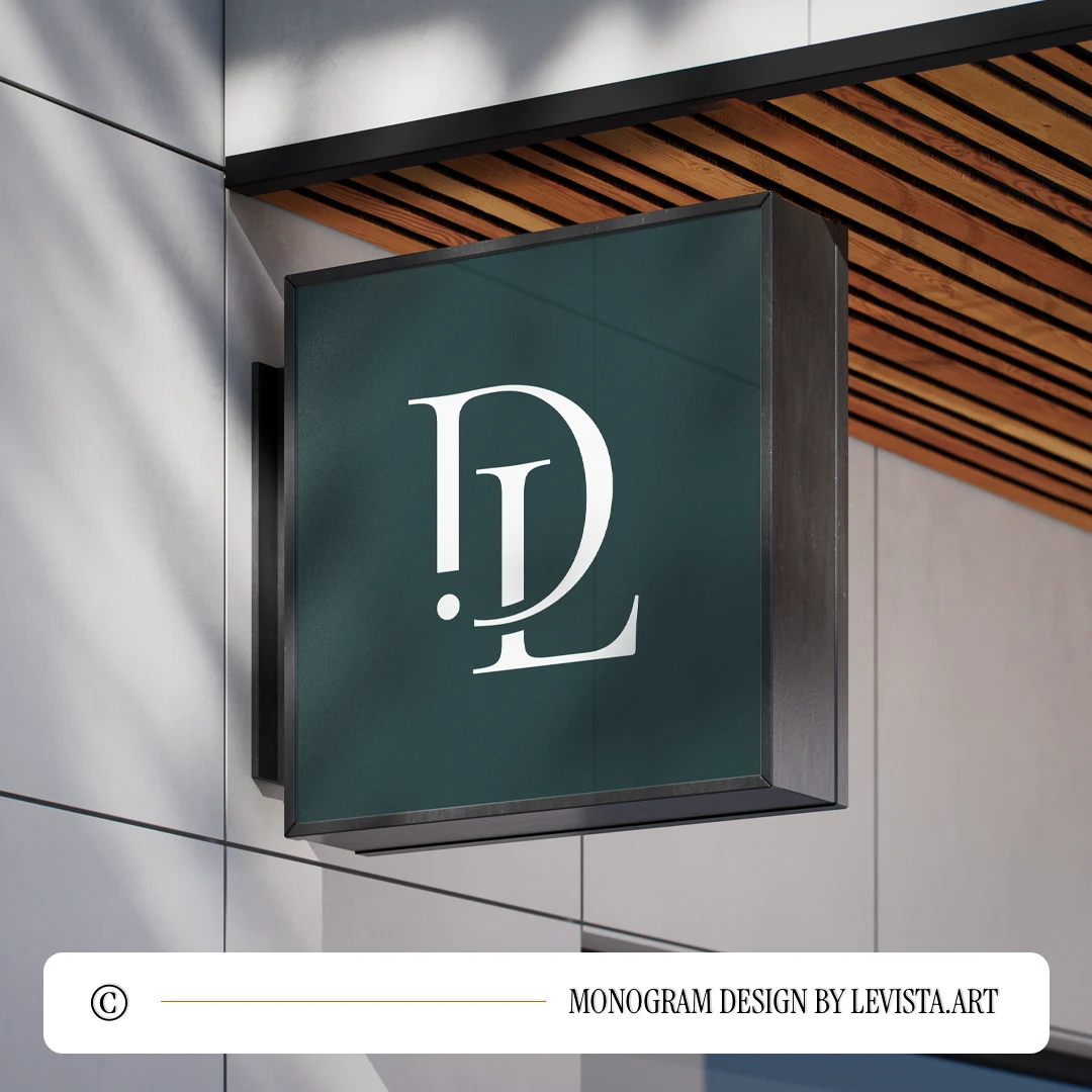 White DL monogram as minimalist interlocking lettermark design on a rich green signboard fixed to a white tiled wall for high-end modern luxury branding & business