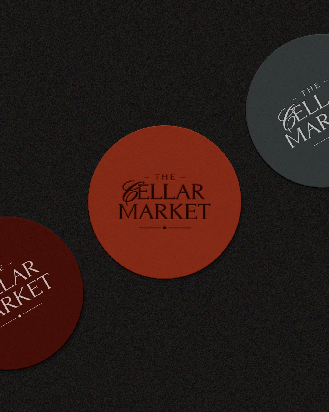 vertical wine store coasters branding design Vertical view of three designer coasters featuring the custom wine store monogram