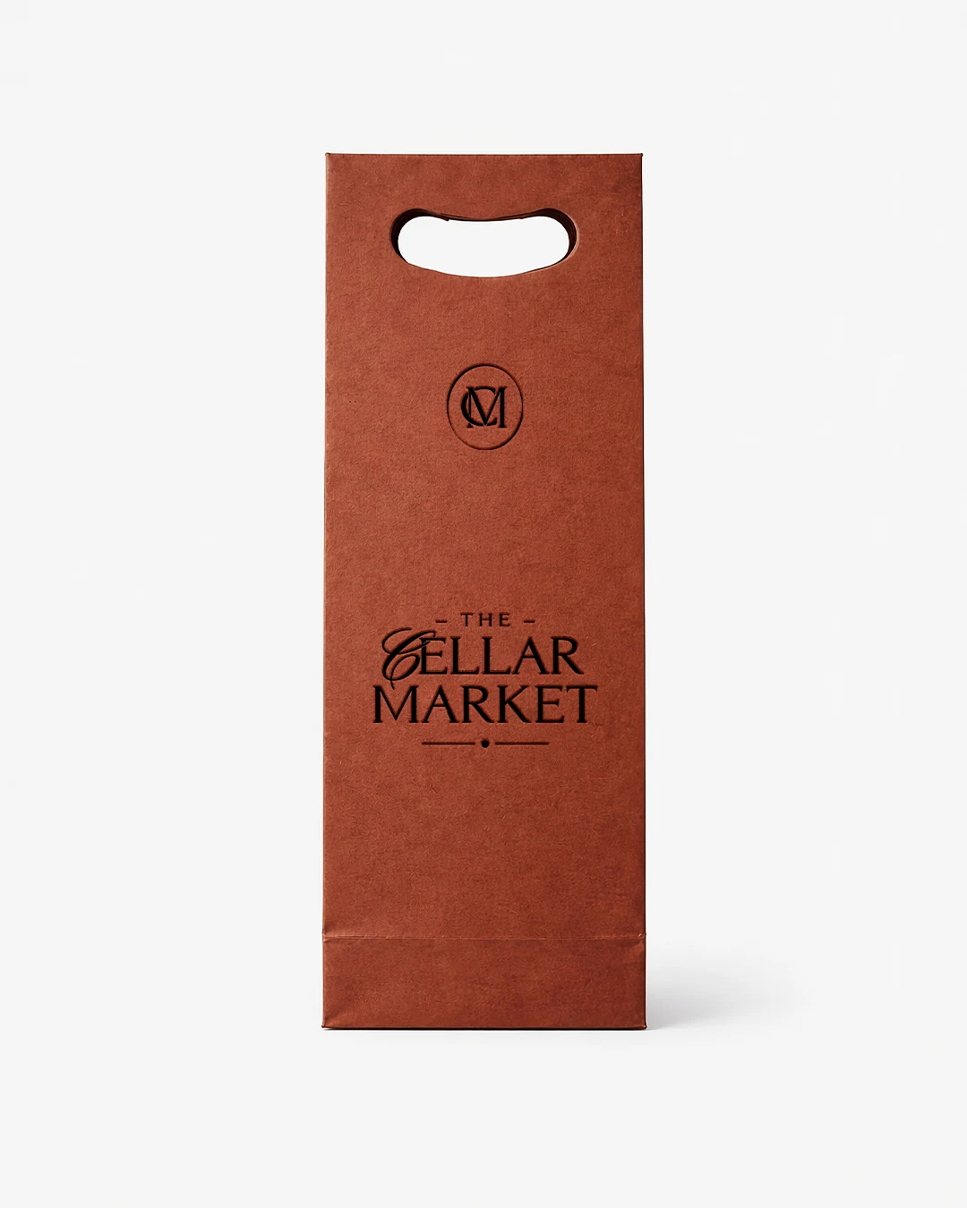 vertical wine store monogram logo packaging Vertical view of a designer craft bag featuring the wine store monogram logo