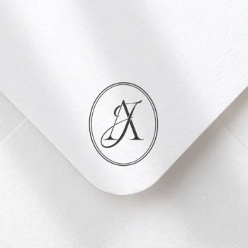 Elegant wedding semi-custom monogram featuring a sophisticated letter design in black on a white textured envelope