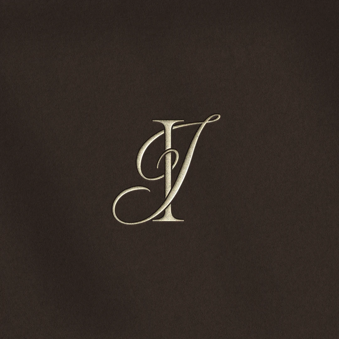 IJ & JI Monogram | Elegant letter logo design Silver IJ & JI letter logo as minimalist initials design on a rich brown background for luxury weddings, premium branding