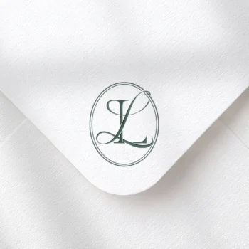 Green LL letter logo as luxury wedding initials design on a textured envelope for premium stationery, embossing & branding