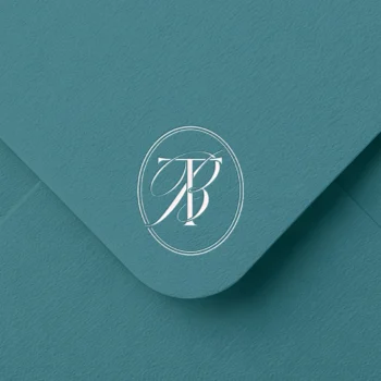 TB & BT Monogram Logo | Elegant letter logo design White TB & BT letter logo as minimalist design on an emerald green envelope for premium wedding stationery and branding