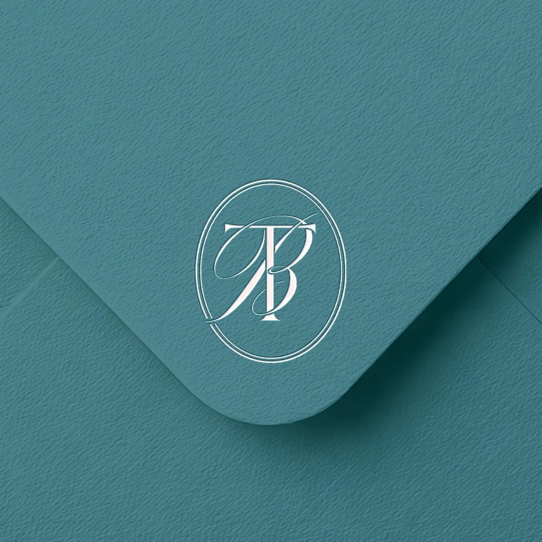 TB & BT Monogram Logo | Elegant letter logo design White TB & BT letter logo as minimalist design on an emerald green envelope for premium wedding stationery and branding