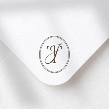 Brown TJ & JT letter logo as refined initials design on textured envelope for sophisticated wedding, embossing, foil stamping