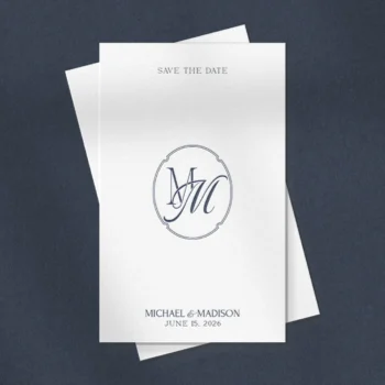 Blue MM letter logo as stylish wedding initials design on a textured save the date card for modern stationery & design ideas