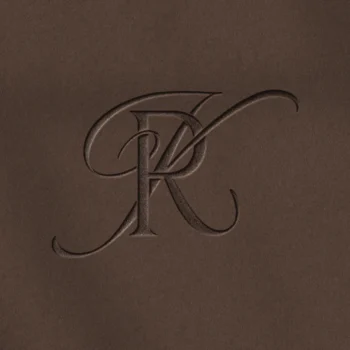 RK & KR Monogram | Wedding letter logo design Embossed RK and KR letter logo as refined initials design on rich brown background for elegant wedding stationery, wax seals