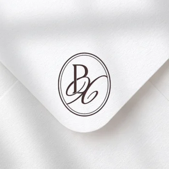 BX Monogram | Elegant letter logo design Rich burgundy BX letter logo as refined initials design on a textured envelope for premium wedding stationery suite, signage, décor and quality print