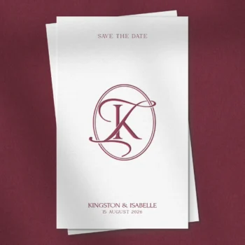 Light burgundy KI and IK letters as stylish initials logo design on save the date card for refined wedding décor, stationery suites and high-quality print