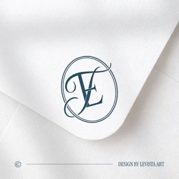 Rich navy blue ET and TE letters as stylish modern initials logo design on a light textured envelope for refined stationery suites, wedding décor and high-quality print