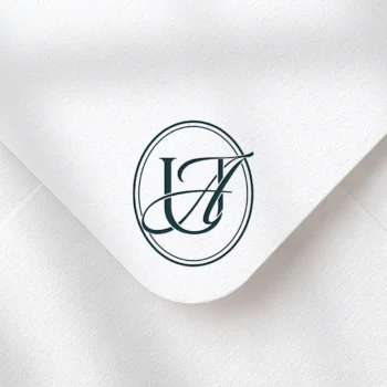 UA & AU Monogram | Elegant letter logo design Blue emerald UA and AU letters as stylish initials logo design on a light textured envelope for refined stationery suites, wedding décor and high-quality print
